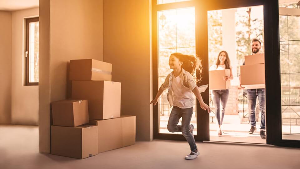 Young family moving into a new house